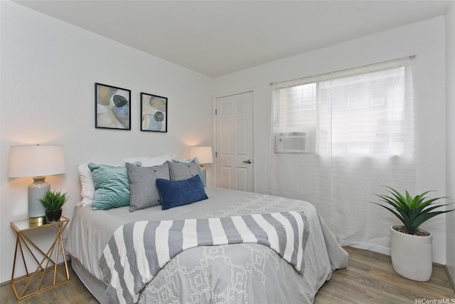 94-1139 Mopua Loop Unit J2, Waipahu, HI 96797 - bedroom featuring wood finished floors and cooling unit
