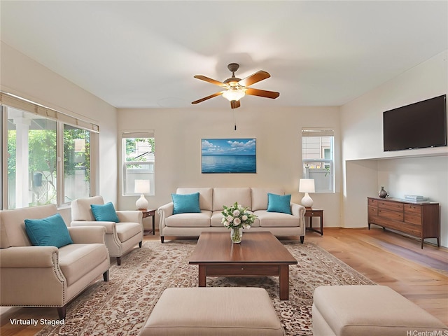 91-1105 Kaiko St, Ewa Beach, HI 96706 - living area with plenty of natural light, light wood-type flooring, and a ceiling fan
