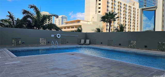 2240 Kuhio Ave Unit 905, Honolulu, HI 96815 - community pool with a patio area