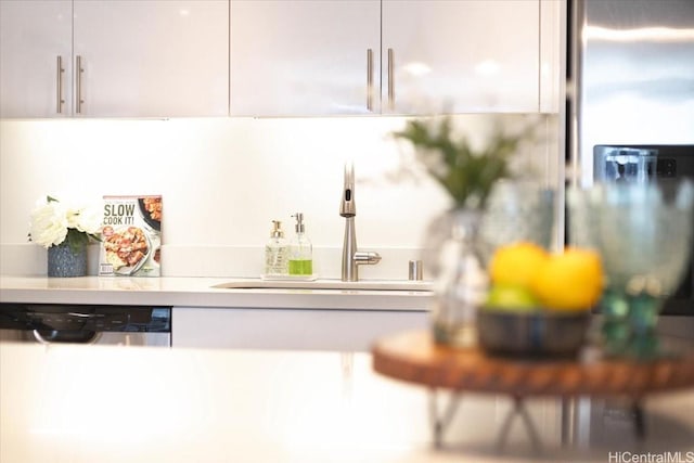 888 Kapiolani Blvd Unit 1512, Honolulu, HI 96813 - kitchen view of a sink, light countertops, stainless steel refrigerator with ice dispenser, and white cabinets