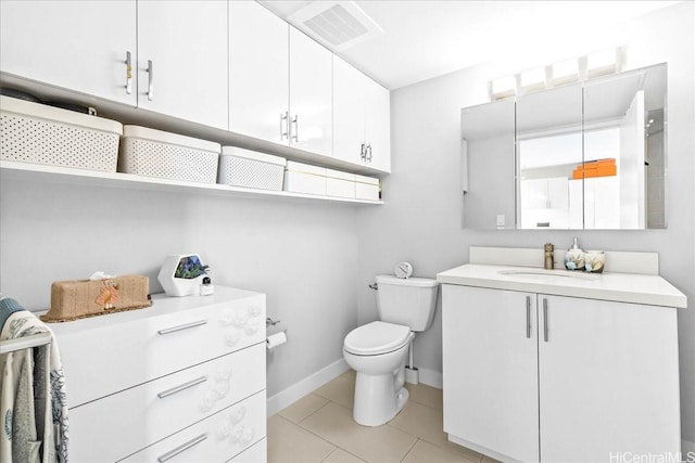 888 Kapiolani Blvd Unit 1512, Honolulu, HI 96813 - bathroom featuring vanity, toilet, baseboards, and tile patterned flooring