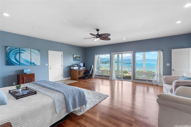 44-97 Kalenakai Pl Unit A, Kaneohe, HI 96744 - bedroom featuring access to exterior, an office area, recessed lighting, wood finished floors, and ceiling fan