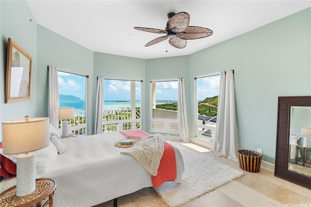 44-97 Kalenakai Pl Unit A, Kaneohe, HI 96744 - bedroom with a water view, access to exterior, ceiling fan, and baseboards