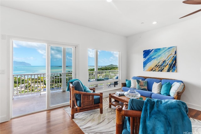 44-97 Kalenakai Pl Unit A, Kaneohe, HI 96744 - living area with a water view, wood finished floors, recessed lighting, and ceiling fan