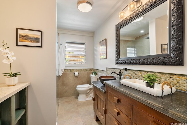 880 Akiu Pl, Kailua, HI 96734 - full bathroom featuring vanity, tile walls, tile patterned floors, and wainscoting