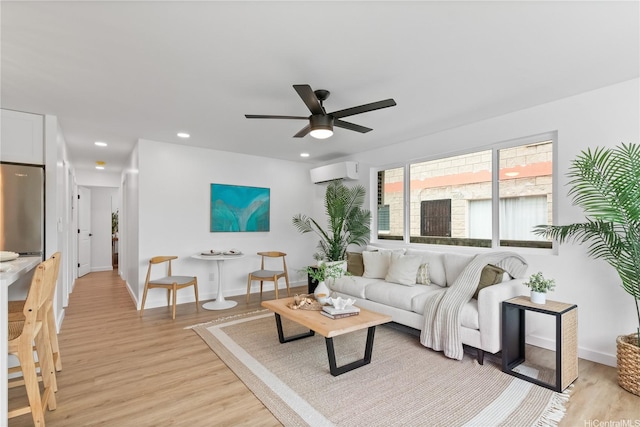 631 Punaa St, Kailua, HI 96734 - living area featuring a wall mounted air conditioner, light wood-style floors, ceiling fan, recessed lighting, and baseboards