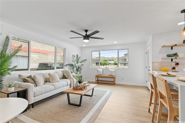 631 Punaa St, Kailua, HI 96734 - living room featuring a ceiling fan, light wood-type flooring, recessed lighting, and baseboards