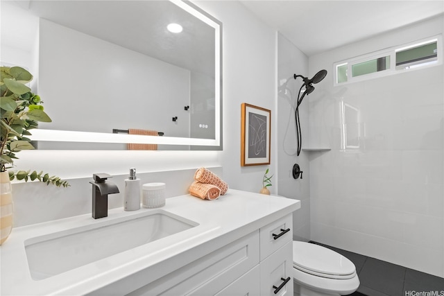 631 Punaa St, Kailua, HI 96734 - bathroom featuring vanity, toilet, a tile shower, and recessed lighting