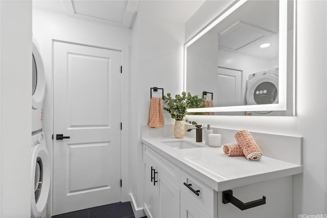 631 Punaa St, Kailua, HI 96734 - bathroom featuring stacked washer / dryer and vanity
