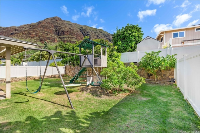 84-575 Kili Dr Unit 53, Waianae, HI 96792 - view of yard featuring a playground and a mountain view