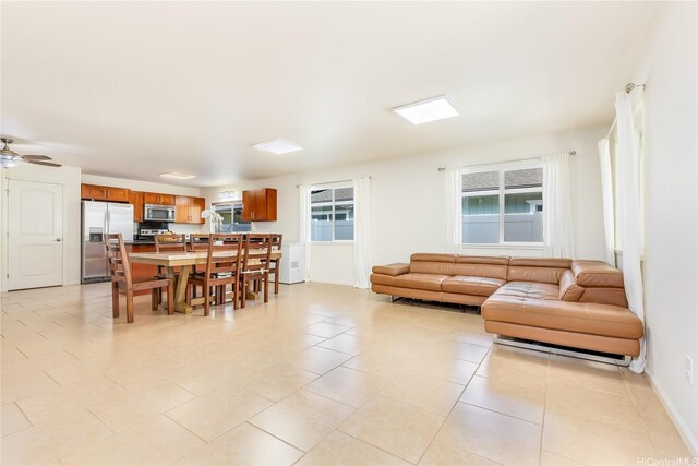 84-575 Kili Dr Unit 53, Waianae, HI 96792 - dining area featuring healthy amount of natural light, light tile patterned floors, baseboards, and a ceiling fan