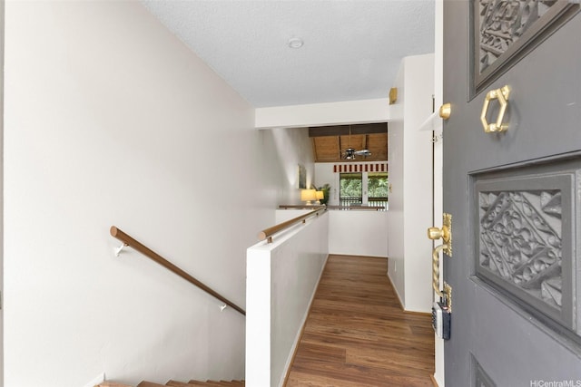 47-658 Hui Kelu St Unit 5, Kaneohe, HI 96744 - foyer entrance with wood finished floors and a textured ceiling