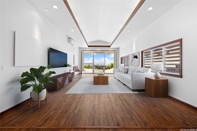 941 Aliamanu Pl, Honolulu, HI 96818 - living room with wood finished floors, recessed lighting, a tray ceiling, and an AC wall unit