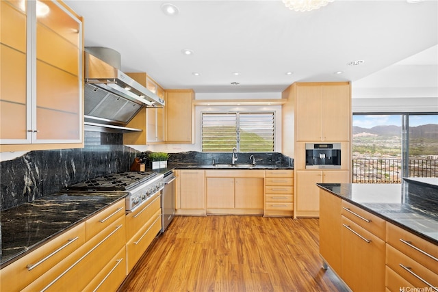 941 Aliamanu Pl, Honolulu, HI 96818 - kitchen featuring light brown cabinets, light wood-style flooring, wall chimney range hood, and recessed lighting