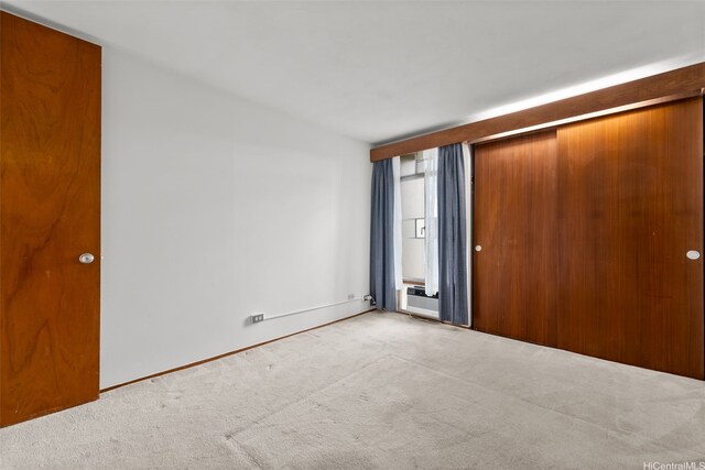 1519 Nuuanu Ave Unit 1044, Honolulu, HI 96817 - carpeted spare room with baseboards