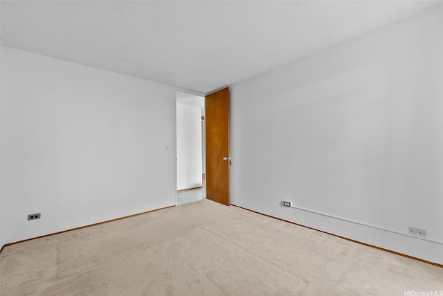 1519 Nuuanu Ave Unit 1044, Honolulu, HI 96817 - unfurnished room featuring light carpet and baseboards