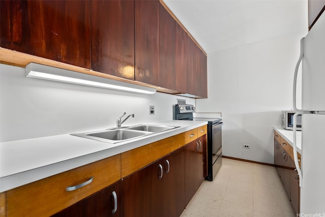 1519 Nuuanu Ave Unit 1044, Honolulu, HI 96817 - kitchen featuring stainless steel range with electric stovetop, a sink, light flooring, and light countertops