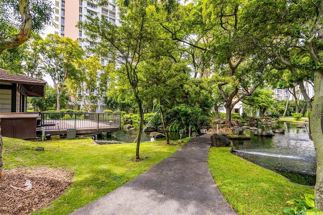 1519 Nuuanu Ave Unit 1044, Honolulu, HI 96817 - surrounding community with a lawn and a jacuzzi