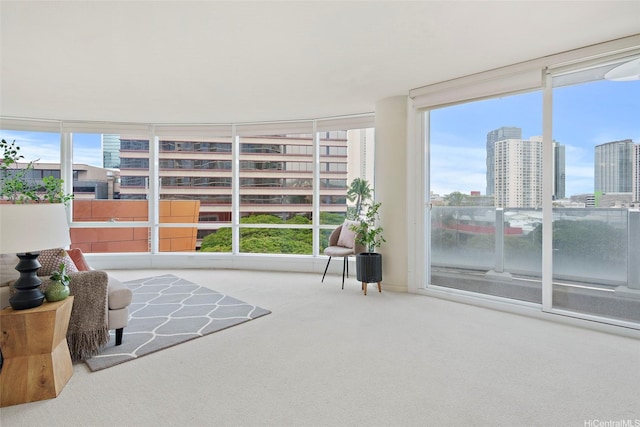 1288 Kapiolani Blvd Unit I-608, Honolulu, HI 96814 - living area with healthy amount of natural light, carpet floors, a wall of windows, and a view of city