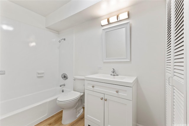 1717 Ala Wai Blvd Unit 701, Honolulu, HI 96815 - full bath featuring vanity, toilet, wood finished floors, tub / shower combination, and a closet