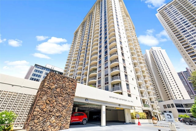 1717 Ala Wai Blvd Unit 701, Honolulu, HI 96815 - view of apartment building / complex with covered parking