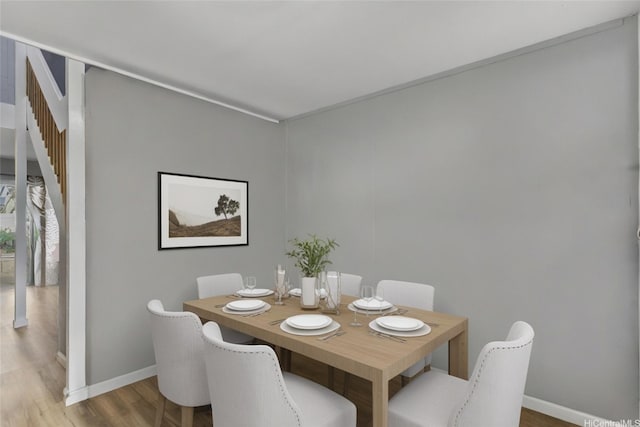 95-100 Moenamanu St Unit 458, Mililani, HI 96789 - dining room with baseboards and wood finished floors