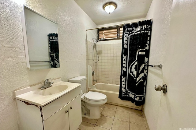 87217 Helelua St Unit 1, Waianae, HI 96792 - full bathroom with a textured wall, vanity, toilet, shower / bath combo with shower curtain, and tile patterned flooring