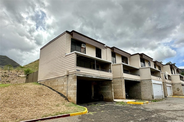87217 Helelua St Unit 1, Waianae, HI 96792 - view of building exterior with an attached garage