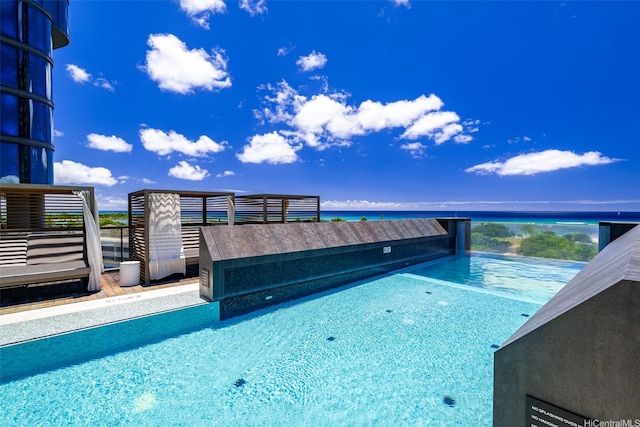 1108 Auahi St Unit 507, Honolulu, HI 96814 - view of swimming pool featuring a water view