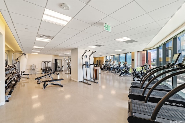 1108 Auahi St Unit 507, Honolulu, HI 96814 - workout area with expansive windows, a drop ceiling, and baseboards