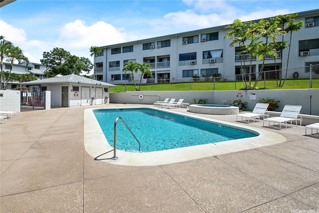 98-626 Moanalua Loop Unit 304, Aiea, HI 96701 - community pool with a patio and a hot tub