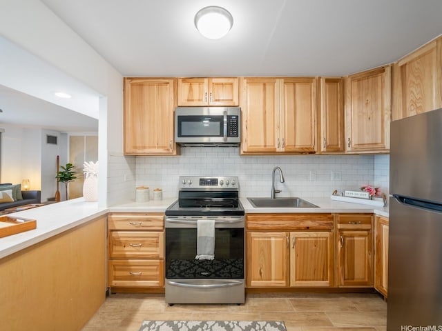 710 Lunalilo St Unit 402, Honolulu, HI 96813 - kitchen featuring appliances with stainless steel finishes, light countertops, decorative backsplash, and light brown cabinetry