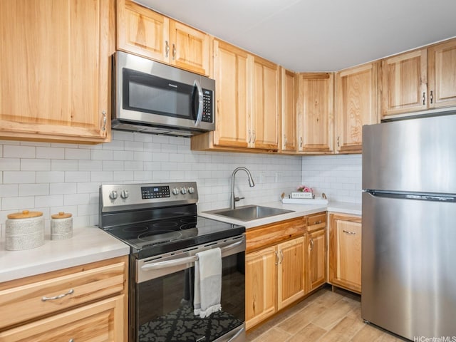 710 Lunalilo St Unit 402, Honolulu, HI 96813 - kitchen with stainless steel appliances, light countertops, light brown cabinetry, and tasteful backsplash