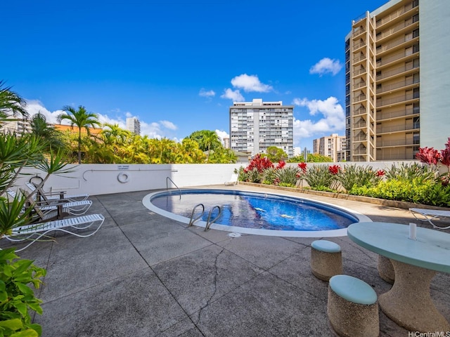 710 Lunalilo St Unit 402, Honolulu, HI 96813 - view of pool with a patio and a city view