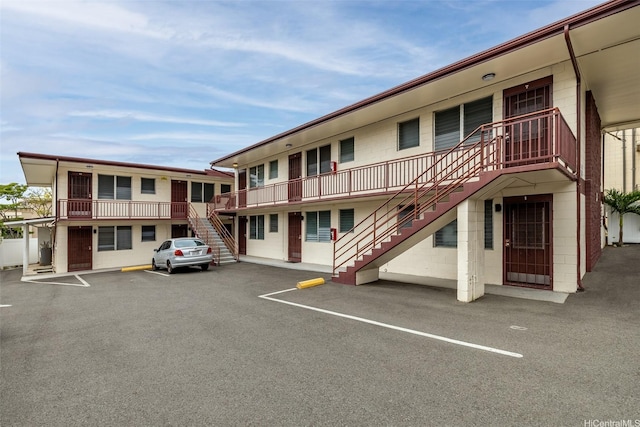 1408 Lusitana St, Honolulu, HI 96813 - view of building exterior with stairs and uncovered parking
