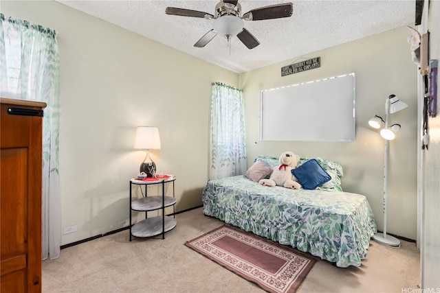 463 Kaleimamahu St, Honolulu, HI 96825 - carpeted bedroom featuring a textured ceiling and a ceiling fan