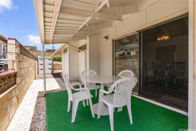 463 Kaleimamahu St, Honolulu, HI 96825 - view of patio / terrace featuring a shed and outdoor dining area