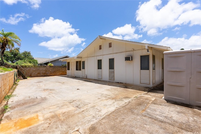 463 Kaleimamahu St, Honolulu, HI 96825 - back of property with a patio area