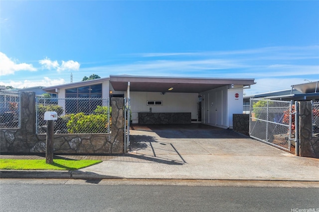 1631 Hoohulu St, Pearl City, HI 96782 - manufactured / mobile home with concrete driveway, an attached carport, and a gate