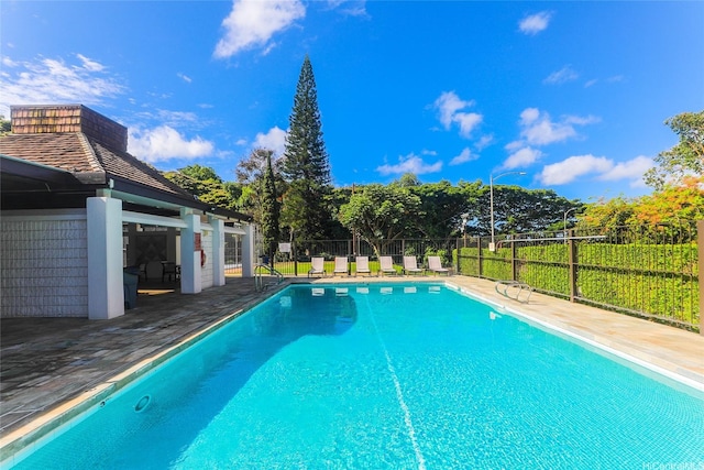 98-500 Koauka Loop Unit 23H, Aiea, HI 96701 - view of pool featuring a patio area