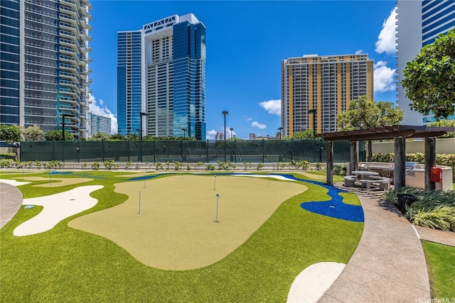 1177 Queen St Unit 4306, Honolulu, HI 96814 - surrounding community with a putting area, a pergola, and a view of city