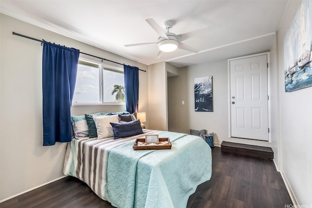 1011-L Alewa Dr, Honolulu, HI 96817 - bedroom with dark wood-style flooring and a ceiling fan