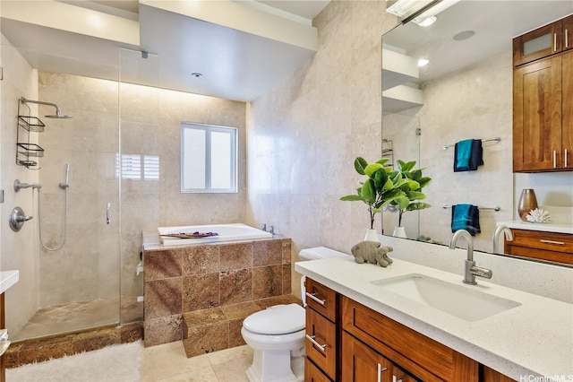 1011-L Alewa Dr, Honolulu, HI 96817 - full bath with tile walls, a shower stall, a bath, tile patterned flooring, and vanity
