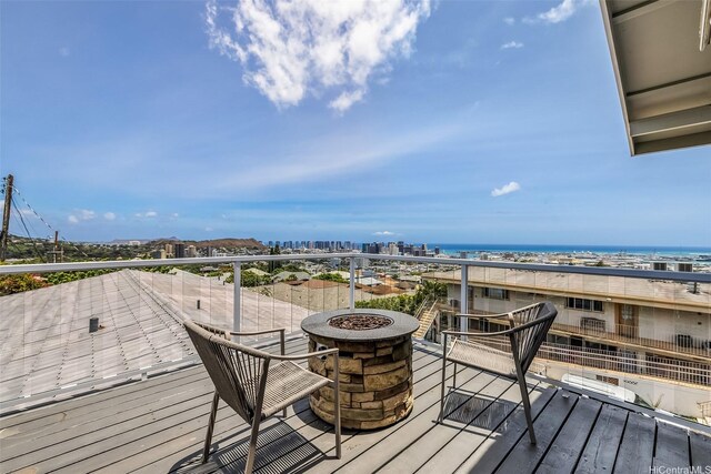 1011-L Alewa Dr, Honolulu, HI 96817 - wooden deck featuring an outdoor fire pit and a water view