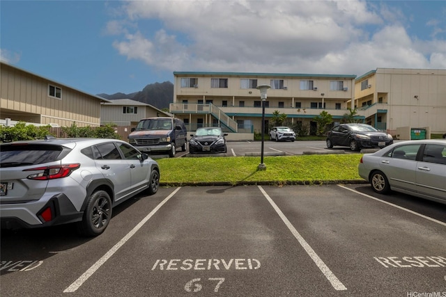 46-232 Kahuhipa St Unit B205, Kaneohe, HI 96744 - view of uncovered parking lot