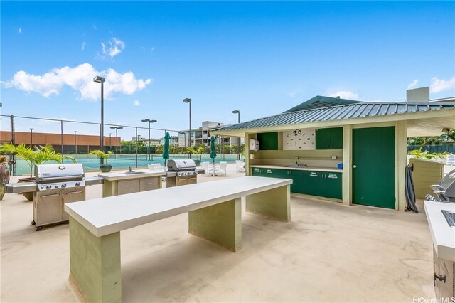 322 Aoloa St Unit 208, Kailua, HI 96734 - view of patio with a sink