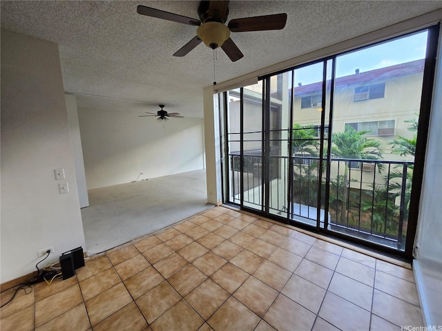 322 Aoloa St Unit 208, Kailua, HI 96734 - carpeted spare room with a ceiling fan and a textured ceiling