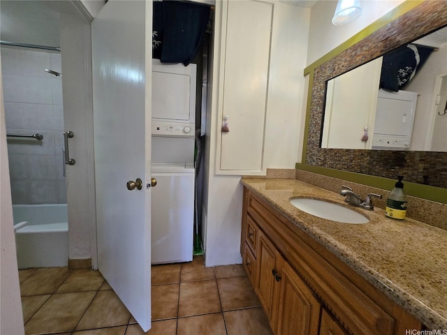 322 Aoloa St Unit 208, Kailua, HI 96734 - bathroom with stacked washer / drying machine, vanity, tile patterned floors, and bathtub / shower combination