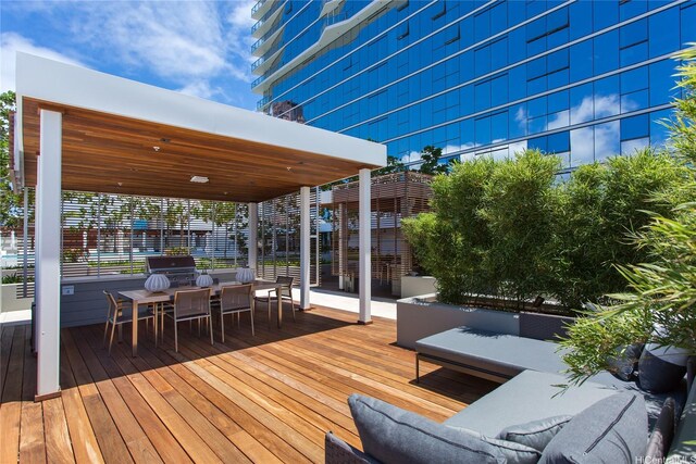 888 Kapiolani Blvd Unit 2703, Honolulu, HI 96813 - wooden terrace featuring outdoor dining space and a grill