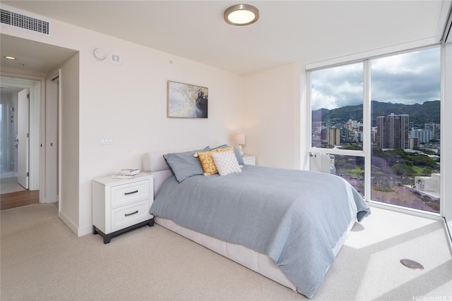888 Kapiolani Blvd Unit 2703, Honolulu, HI 96813 - bedroom with light colored carpet and a mountain view